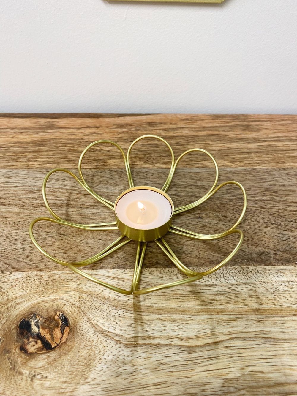 Gold Flower Wire Tealight Holder on desk